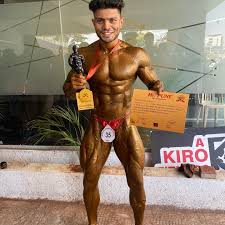 Kashyap Ranade - Mr. Pune bodybuilding competition winner with trophy